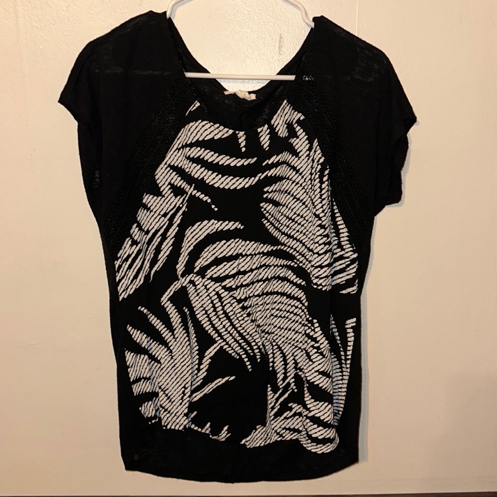 Maurice’s flowy black and white top.